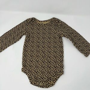Baby’s long sleeve cheetah print onesie
